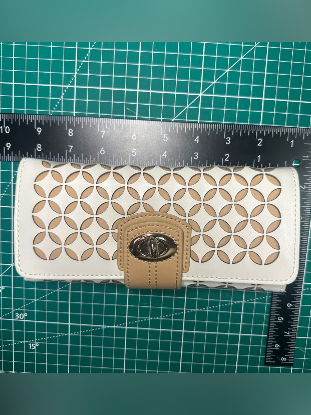 WOLF Cream and Tan Cutout Turn-Lock Travel Jewelry Roll